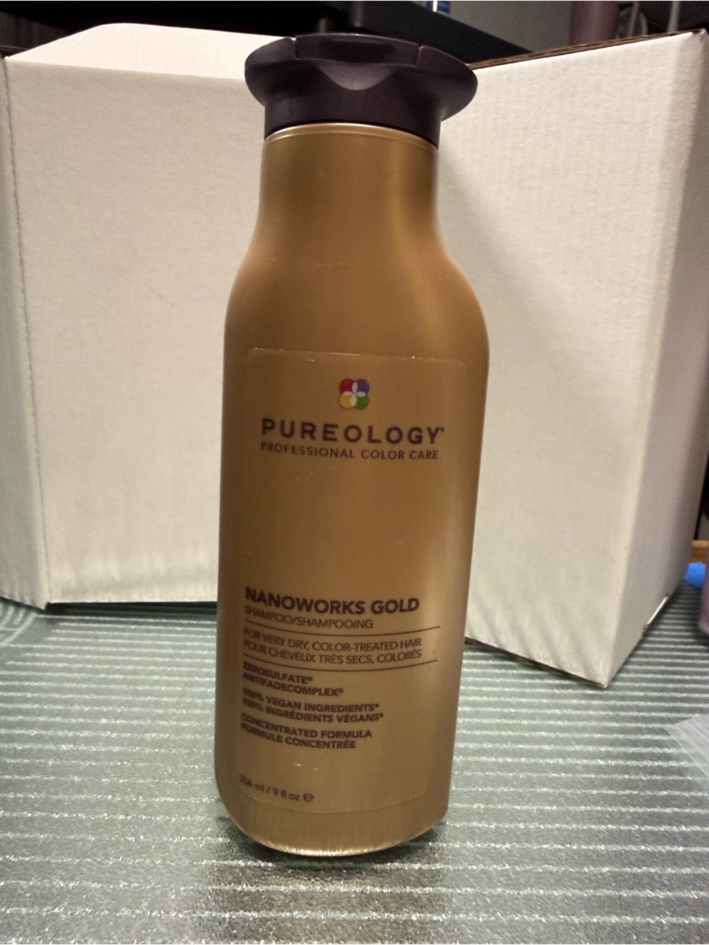 Pureology Nanoworks Gold Bottle with Dark Brown Cap